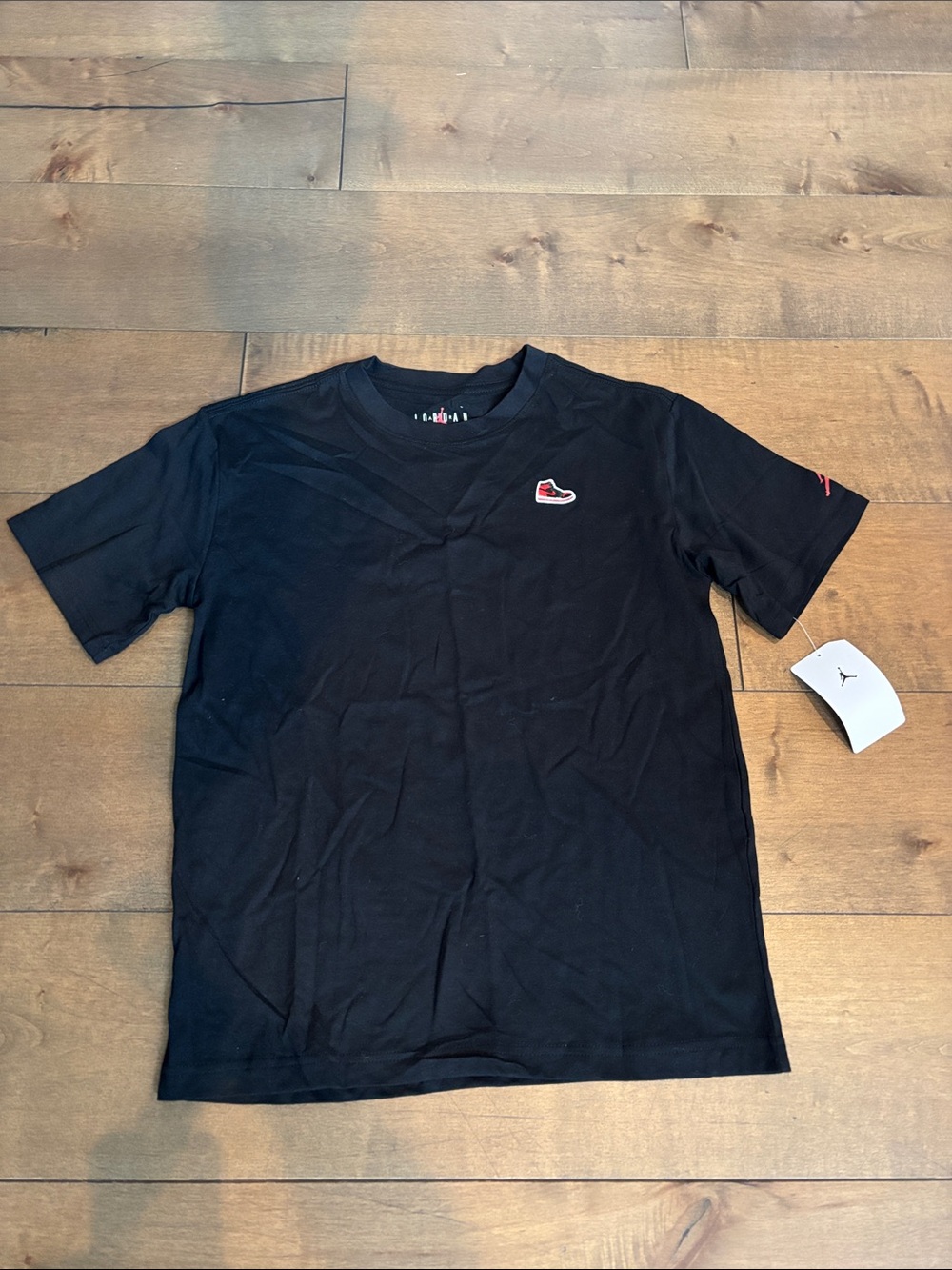 Jordan Black Short-Sleeve Tee with Red Shoe Patch, kids size L, NWT